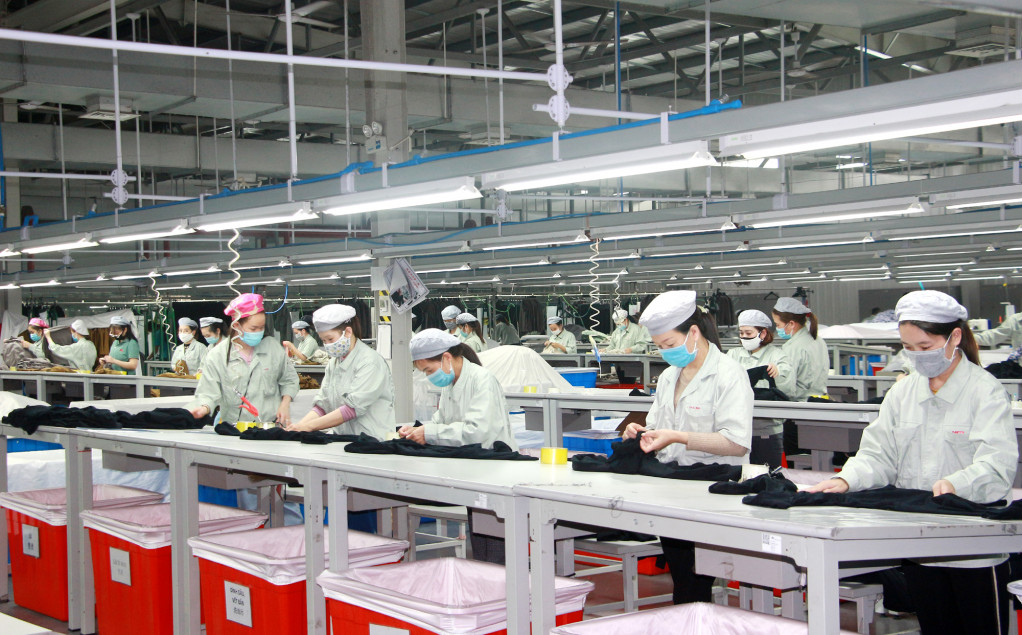 Sản xuất các sản phẩm dệt may tại Công ty TNHH Dệt may Hoa Lợi Đạt Việt Nam tại KCN Cảng biển Hải Hà. Ảnh: Mạnh Trường