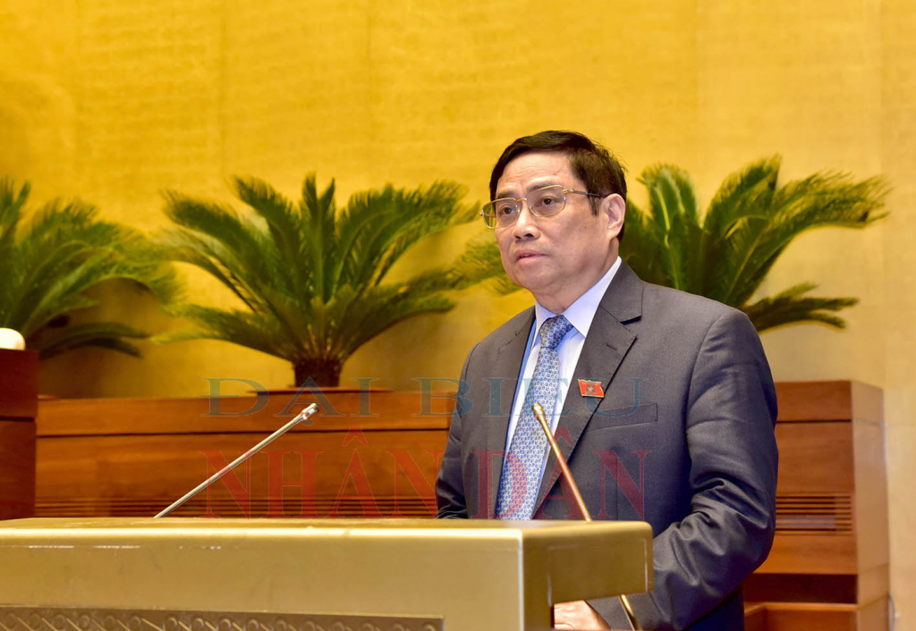 Thủ tướng Phạm Minh Chính trình bày báo cáo kết quả thực hiện kế hoạch phát triển kinh tế - xã hội năm 2021, dự kiến kế hoạch phát triển kinh tế - xã hội năm 2022