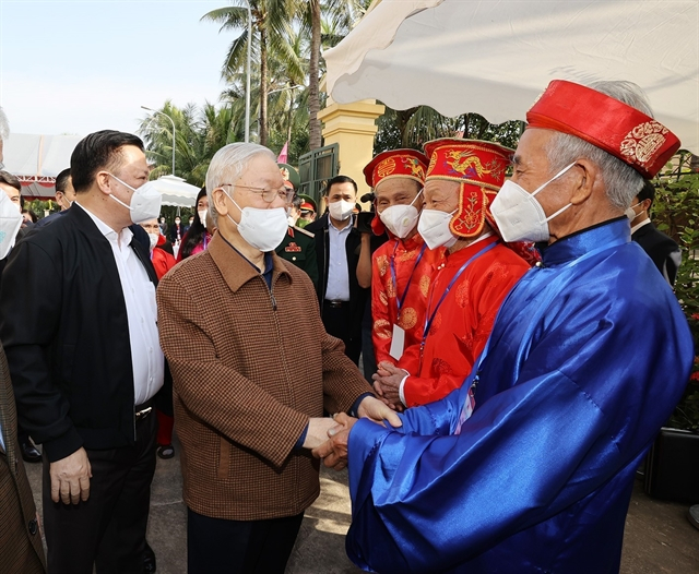 Party General Secretary Nguyễn Phú Trọng visits the residents of village 5, Yên Sở Commune, Hoài Đức District, Hà Nội as he attends a ceremony celebrating the Great National Unity Day yesterday
