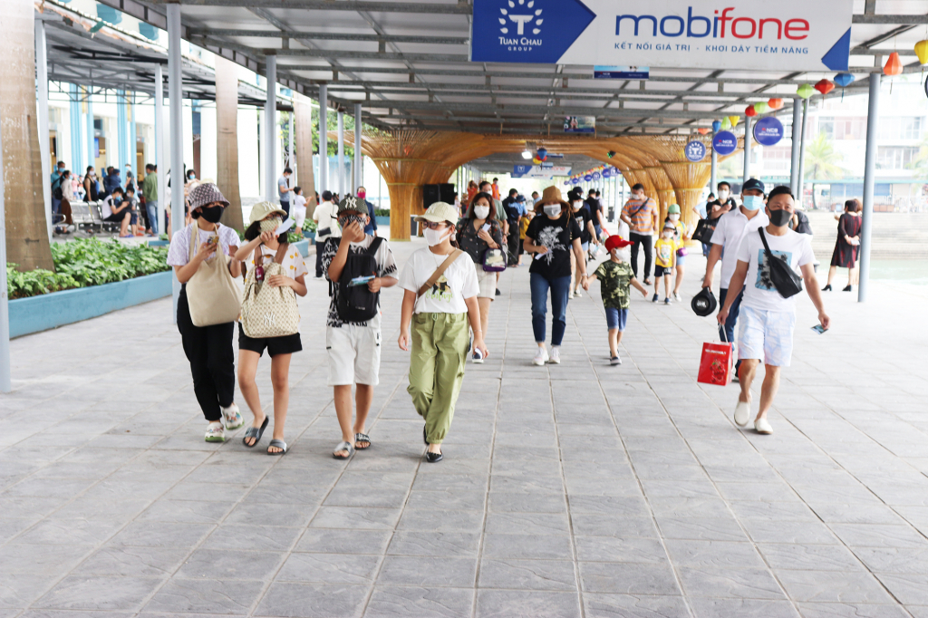 Tourists arrive at Tuan Chau International Passenger Port.