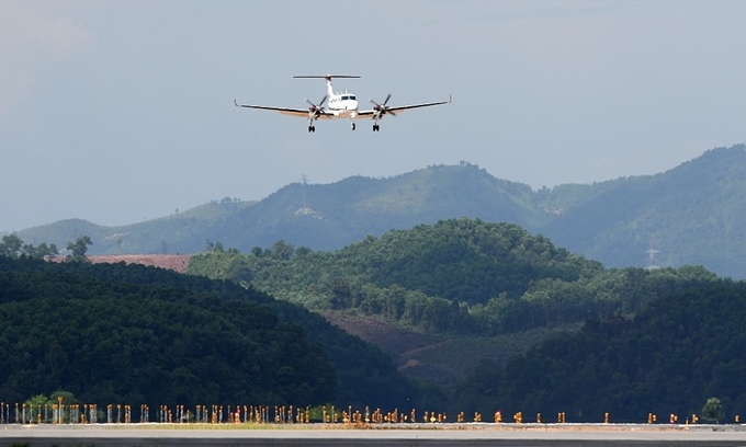 A plane prepares to land at Van Don Airport in Quang Ninh. 
