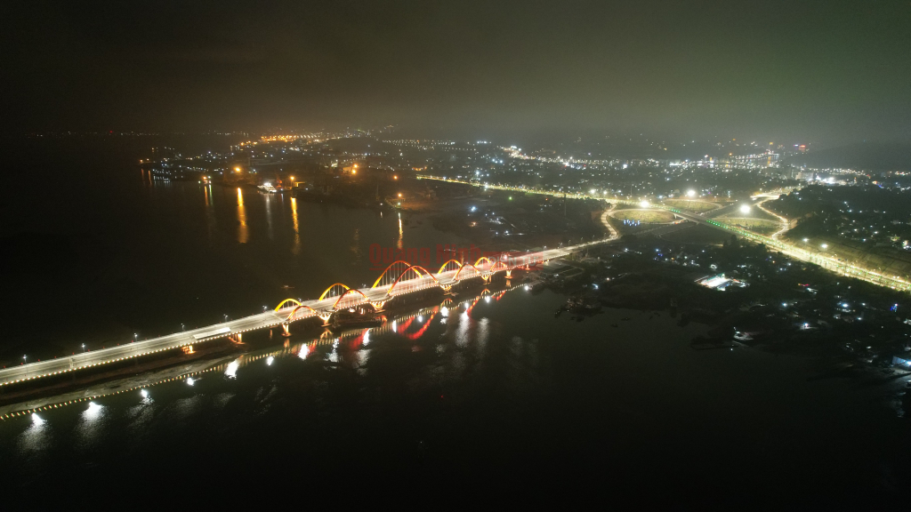 An aerial view of Love Bridge at night.
