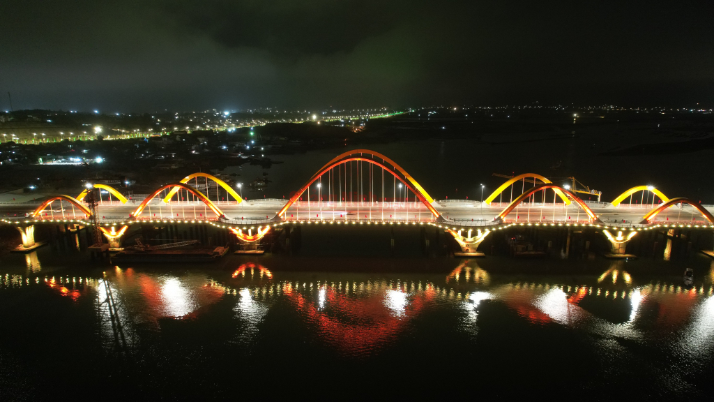 The artistic lighting of the bridge is designed to highlight the theme of a sea bird's wings.