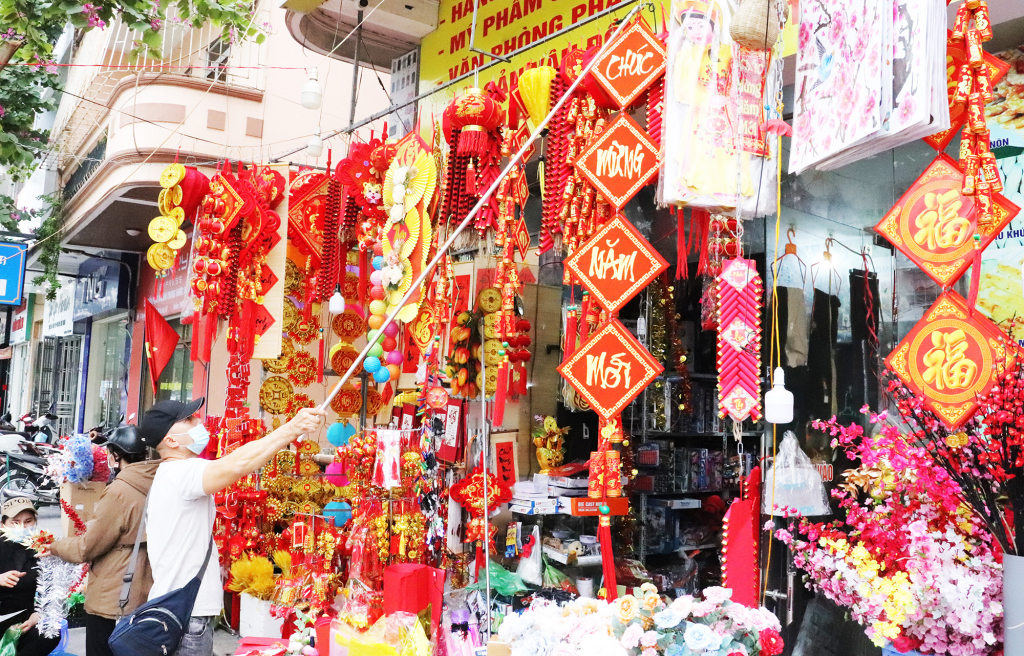 Streets in Ha Long city are filled with the red color of home decorations on Tet holiday.