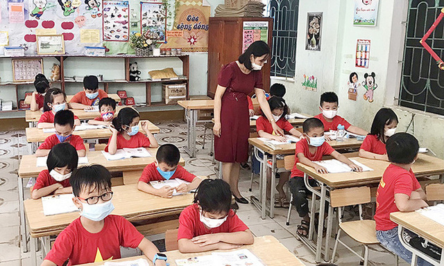 PM urges early physical school resumption after Tet holiday