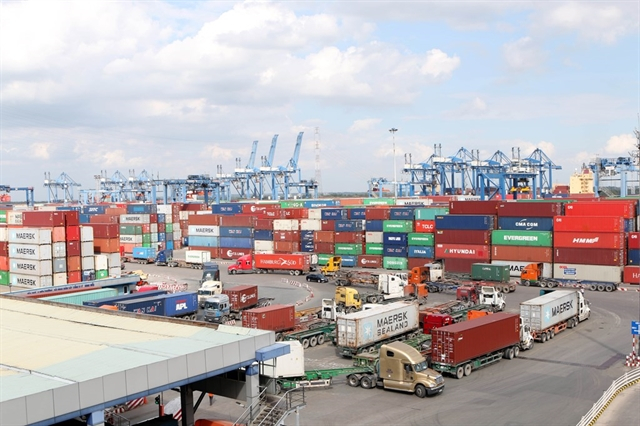 Container trucks waiting to unload at Cát Lái Port in HCM City.