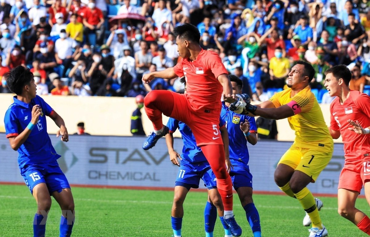 U23 Lào (áo xanh) đánh rơi chiến thắng dù dẫn trước 2-0 đến phút 88. (Ảnh: Tuấn Anh/TTXVN)