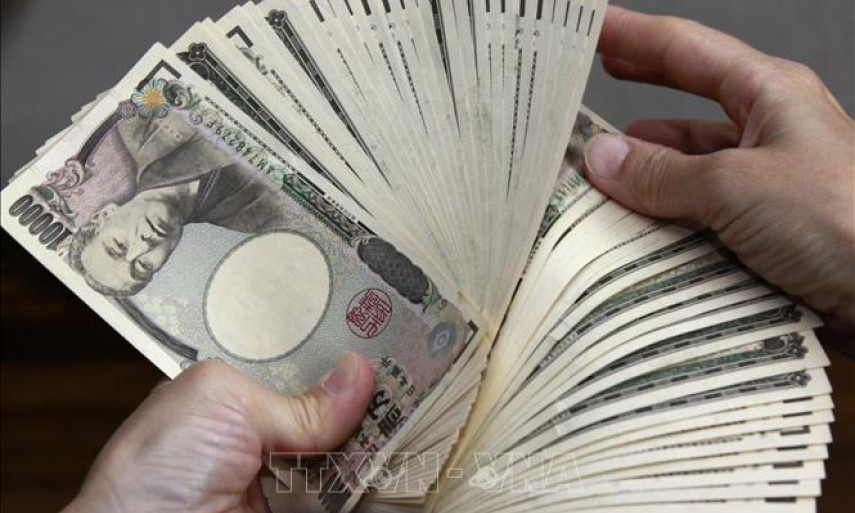 Đồng yen tụt xuống mức thấp nhất trong 20 năm so với USD 