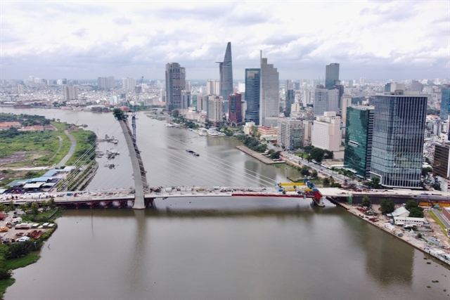 A view of Thủ Thiêm spanning across the Saigon River. Việt Nam is one of the world's few countries to record growth in two consecutive years since the COVID-19 pandemic. 