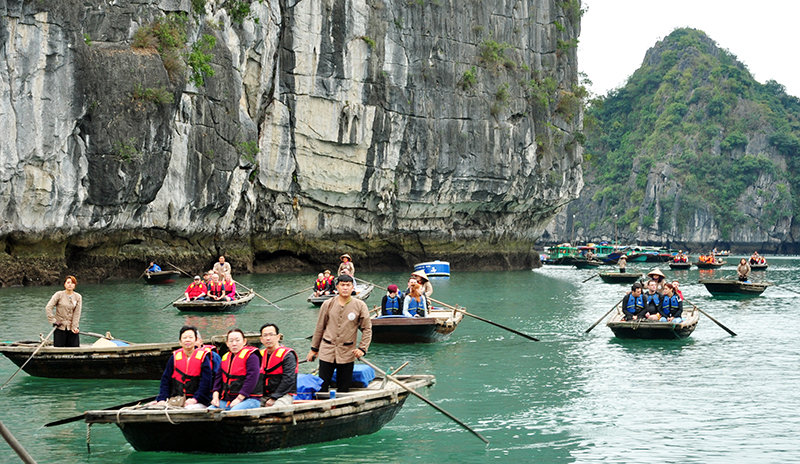 Tourists visit Ha Long Bay