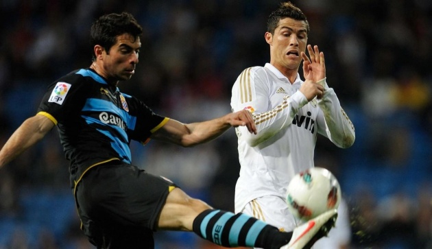 Amat từng có dịp đối đầu Cristiano Ronaldo khi còn chơi cho Espanyol. Ảnh: Marca.