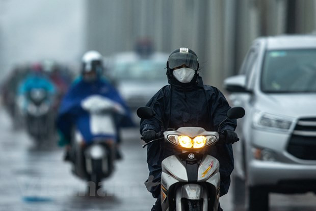 Khong khi lanh tang cuong toan Bac Bo, Thu do Ha Noi troi mua ret hinh anh 1