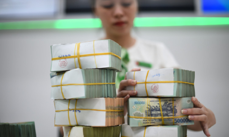 Ngân hàng sẽ giảm 0,5% lãi suất khoản vay cũ
