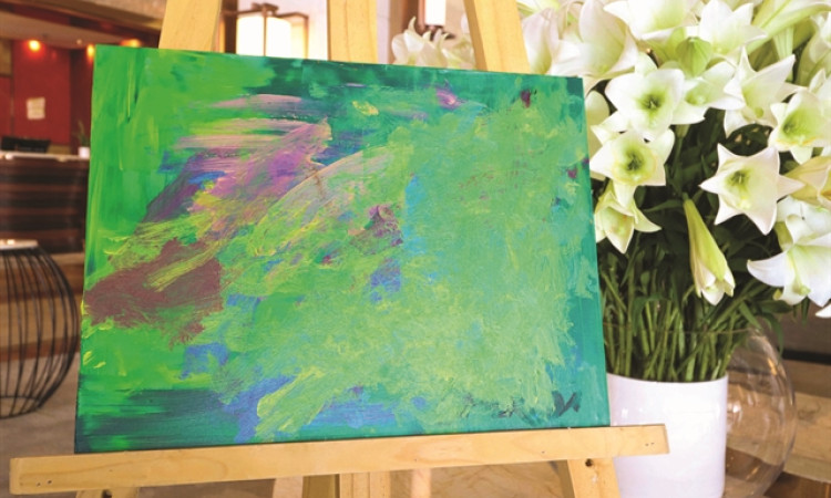 Fund-raising exhibition presents paintings by children with autism