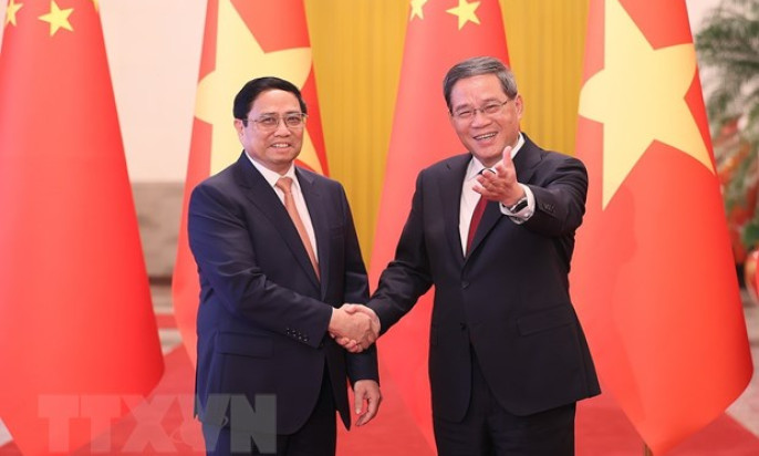 Thủ tướng Lý Cường chủ trì Lễ đón Thủ tướng Phạm Minh Chính