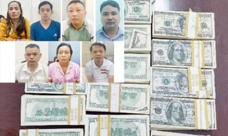 Khởi tố 7 kẻ mua bán ngoại tệ giả giá trị hơn 13 tỷ đồng