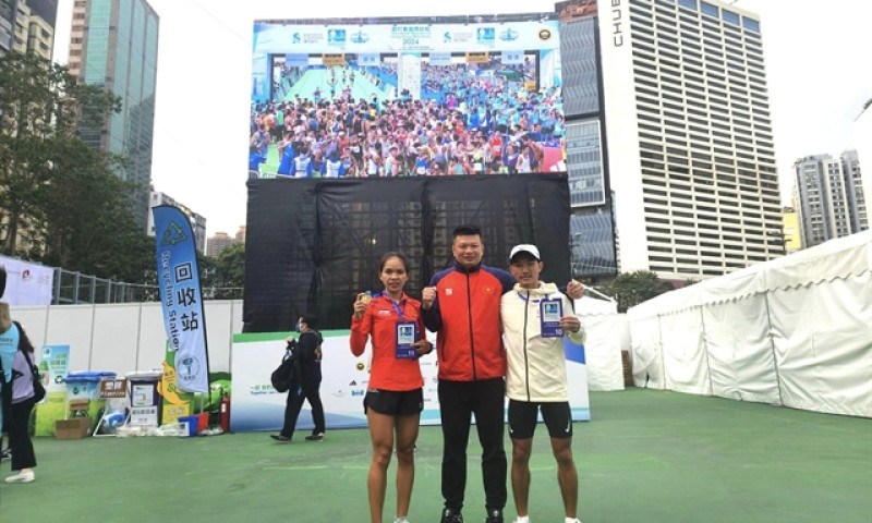 Thanh, Hoa set national marathon records at Asian championship