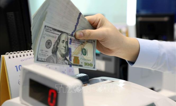 Áp lực lên tỷ giá năm 2024 sẽ giảm bớt
