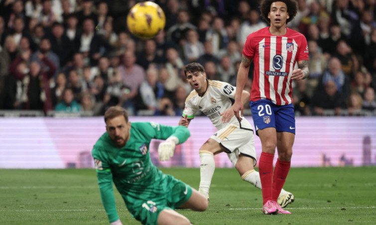 Real rơi chiến thắng trước Atletico ở phút bù