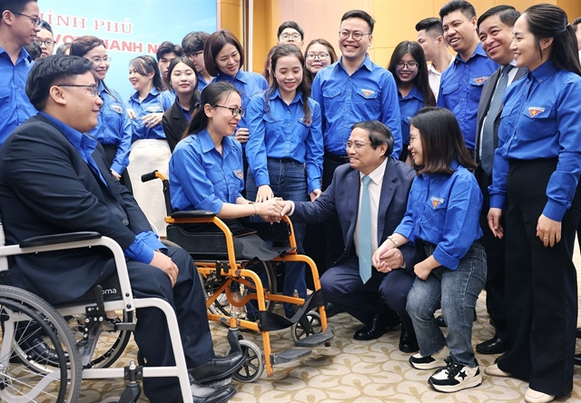 Prime Minister Phạm Minh Chính speaks to young people at the event. — VNA/VNS Photo Dương Giang