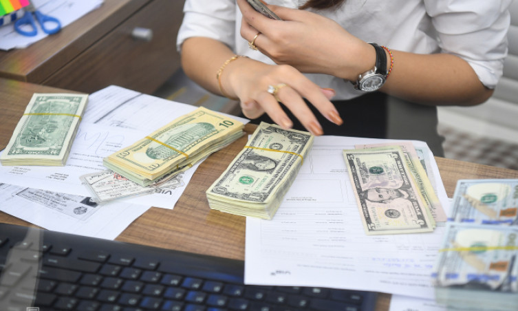 Giá USD tự do lên 25.700 đồng