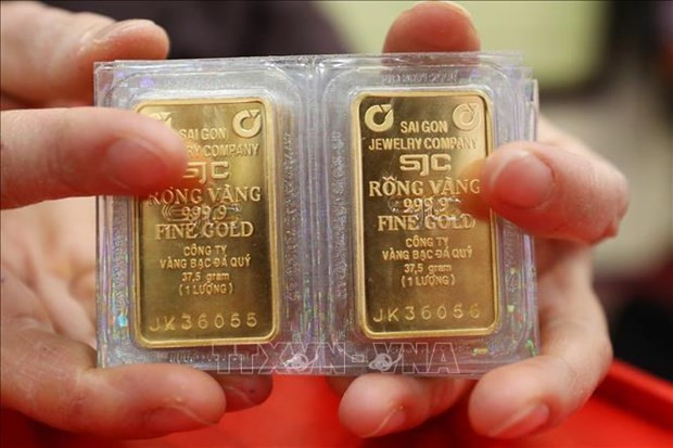 Gold price increases 8% in Q1 hinh anh 1