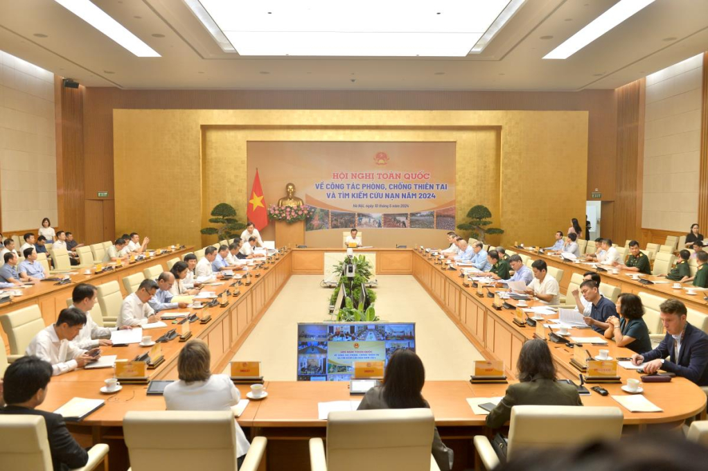 Các đại biểu tham dự Hội nghị tại đầu cầu Hà Nội. (ảnh báo Biên phòng)