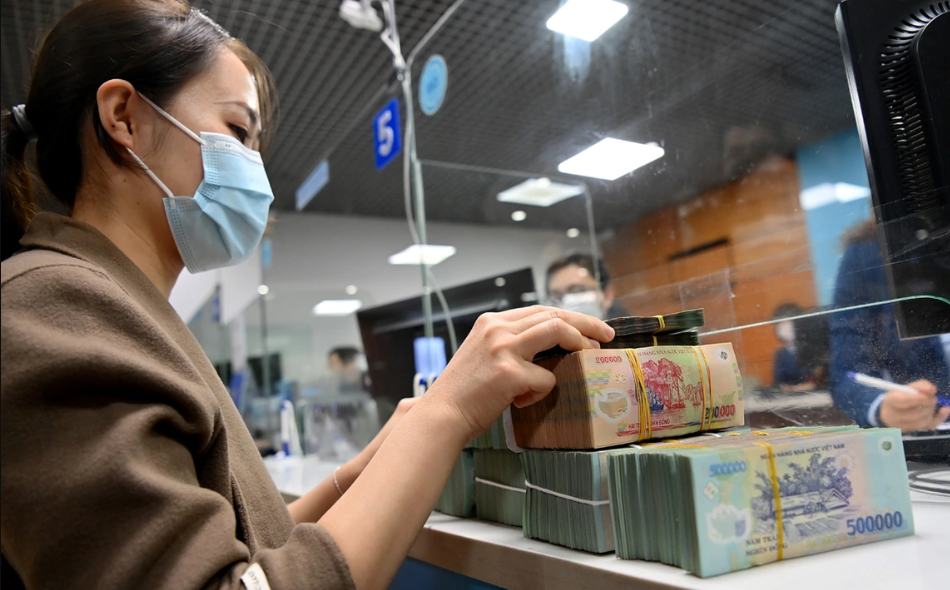 Xử lý nợ xấu ngân hàng có nhiều tín hiệu tích cực - Ảnh 1. Xử lý nợ xấu ngân hàng có nhiều tín hiệu tích cực - Ảnh 1.