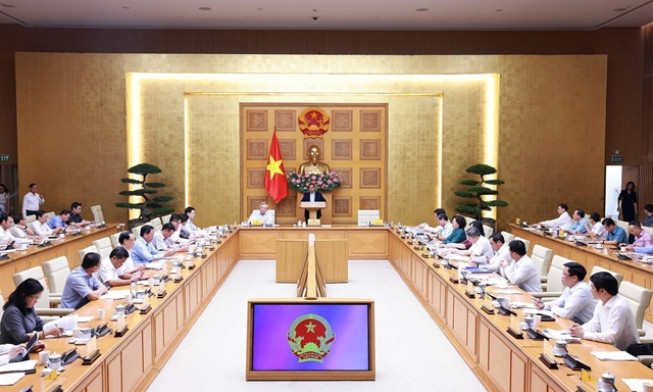 Two-tier local administration system operates stably, smoothly after one month: PM